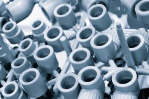 a collection of PVC pipe fittings